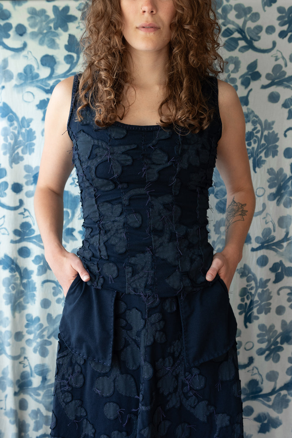 Alabama Chanin Sylvan Negative Reverse Hand Sewn Corset and Inside Out Skirt in Navy on a Model