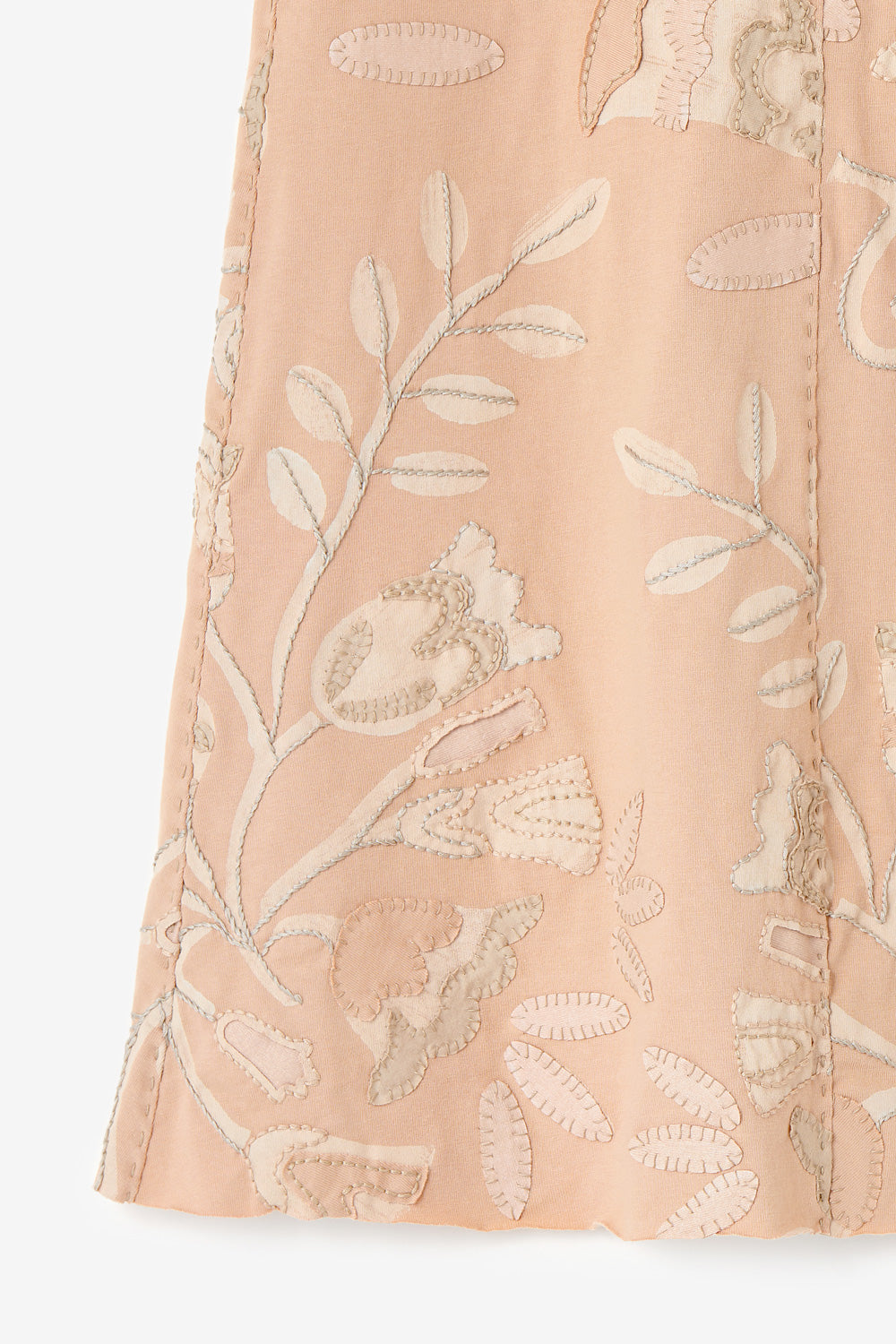 Detail of the Somerset Skirt with hand-sewn appliqué and embroidery.
