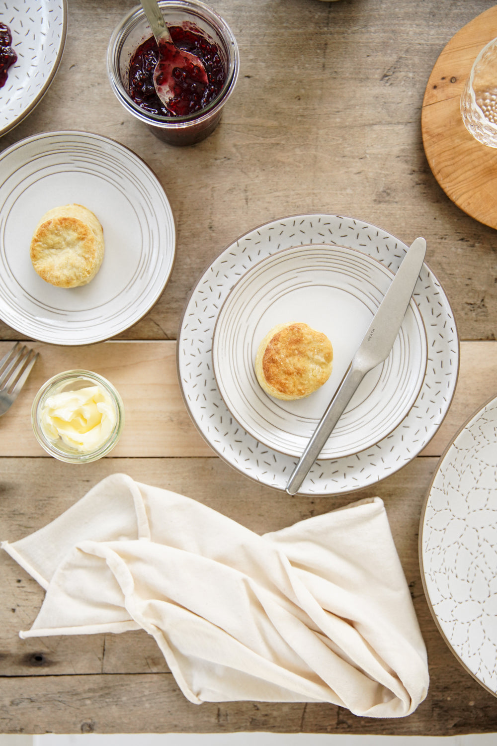 Echo Etched Bread and Butter plate, showing with biscuits and jam.