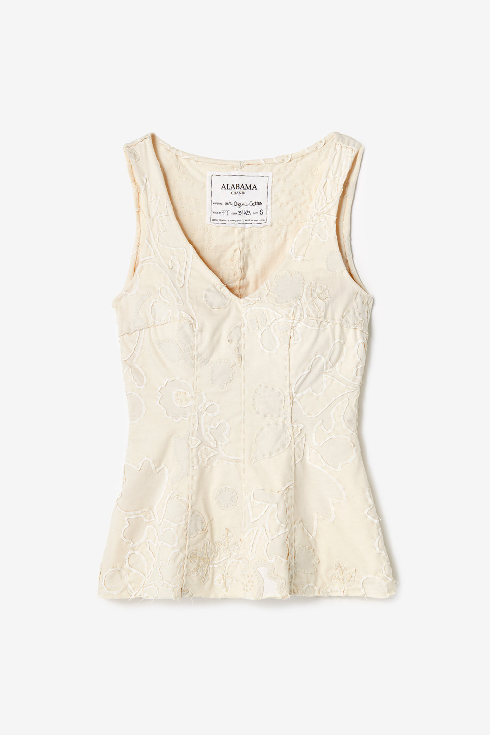 The Haven Top in hand-sewn organic cotton with floral appliqué and embroidery. Shown in Natural colorway.