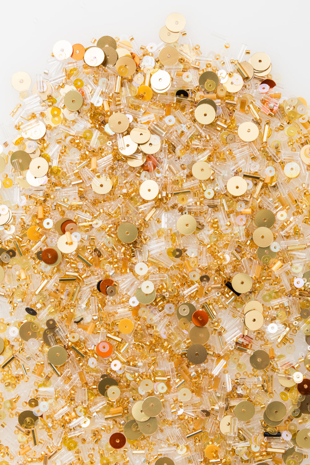 Gold Bomb bead mix featuring beads and sequins in gold and clear glass.