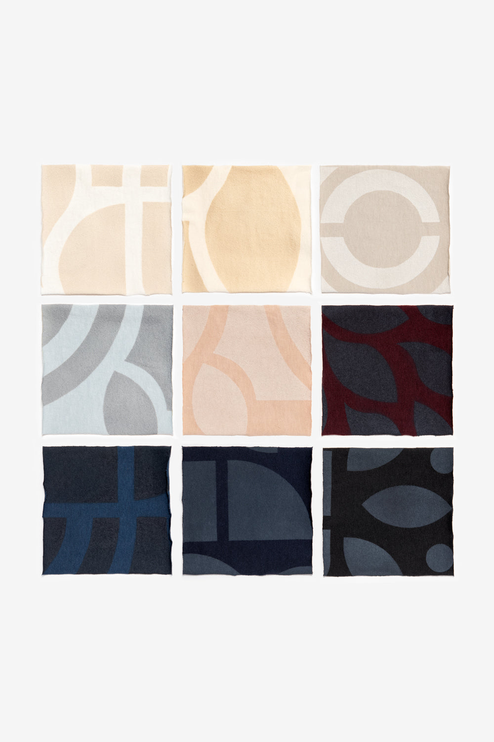 Fabric samples in various colors, stenciled with the Abstract Stencil.