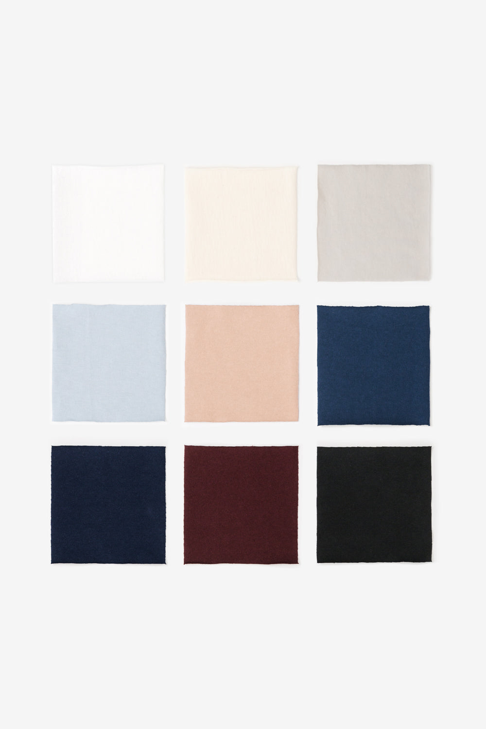Fabric squares in nine different colors.