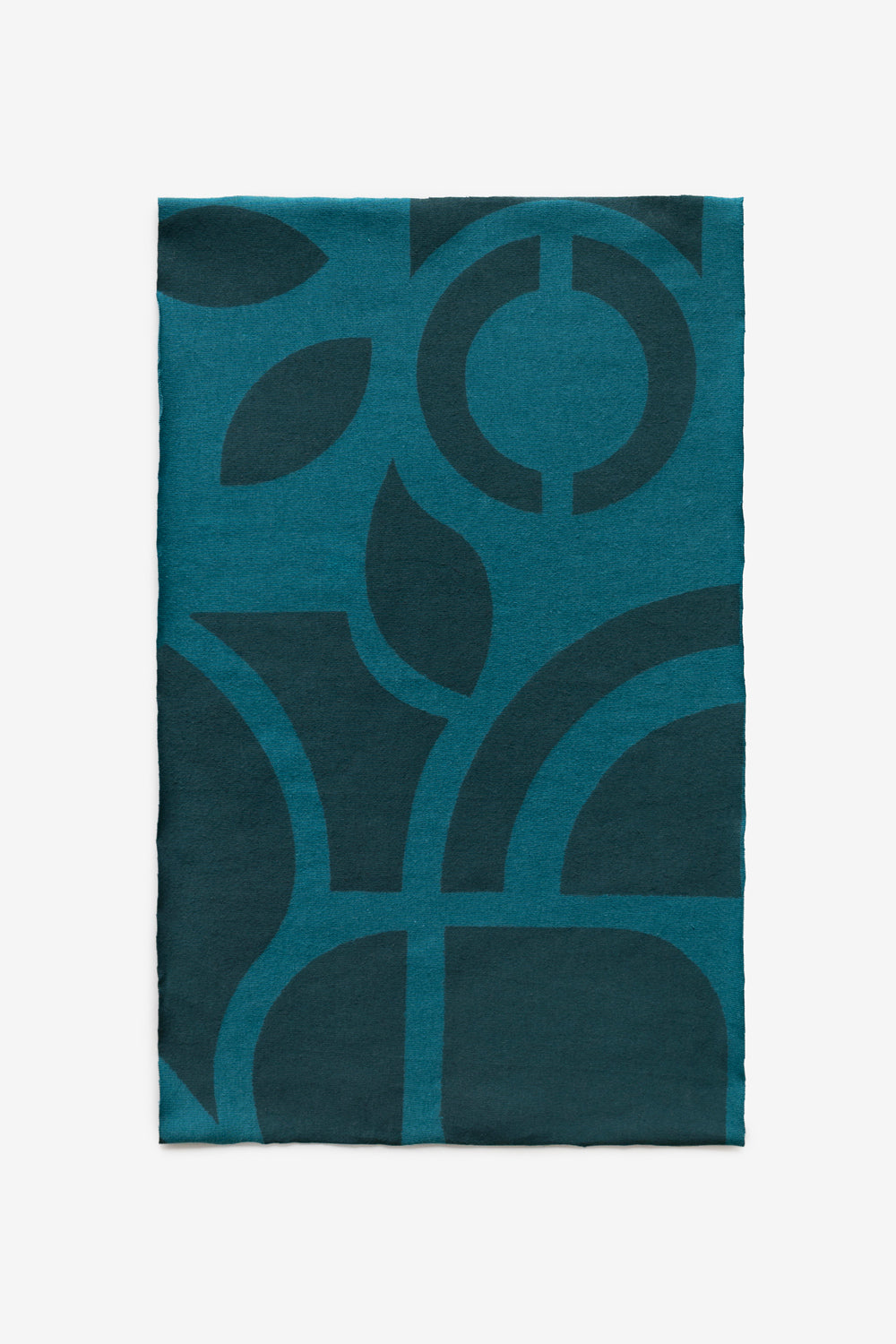 Teal fabric stenciled with the Abstract design in tonal paint.