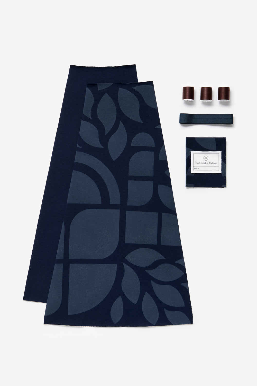 The School of making DIY kit content of the Swing Skirt in navy, with Abstract stencil design. Features pre-cut fabric and notions.