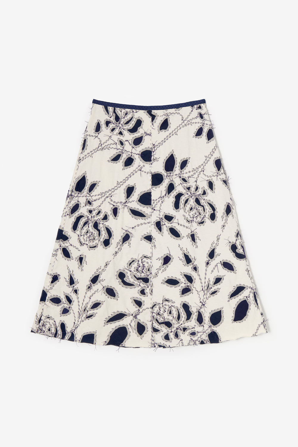 Swing Skirt with rose stencil and reverse appliqué in natural and navy.