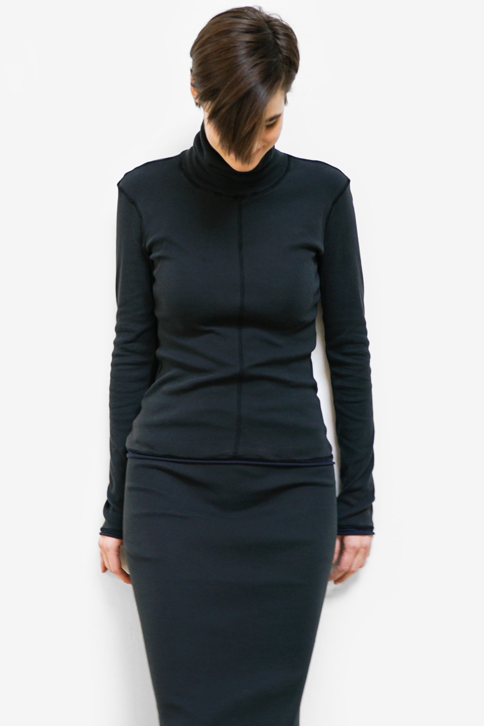 Model for Alabama Chanin organic cotton womens black rib turtleneck with long sleeves