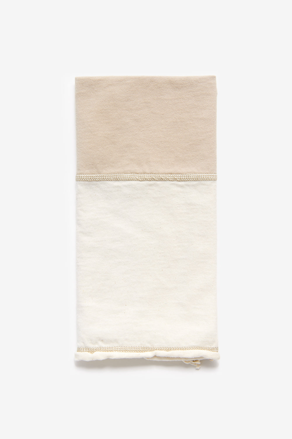 Alabama Chanin Colorblock Dinner Napkins, shown in Wax and Natural colors.