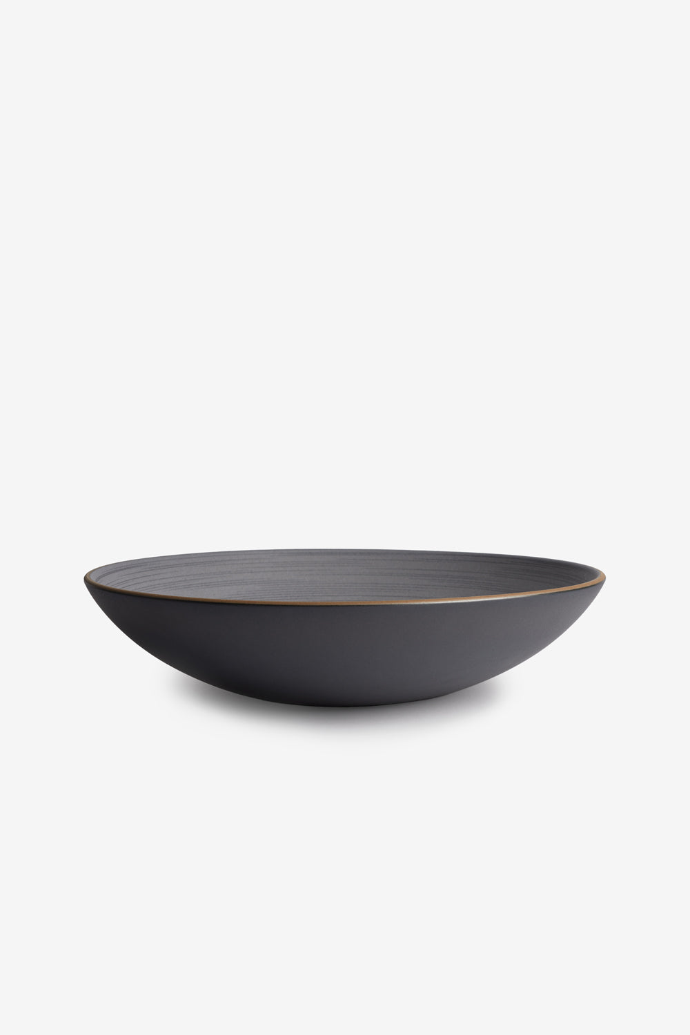 Side View of Echo Etched Shallow Wide Salad Bowl in Indigo from Alabama Chanin and Heath Ceramics Collaboration