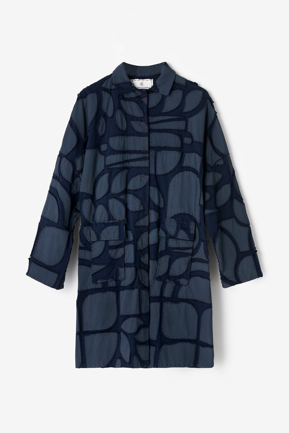 The School of Making Car Coat in navy with abstract stencil design.