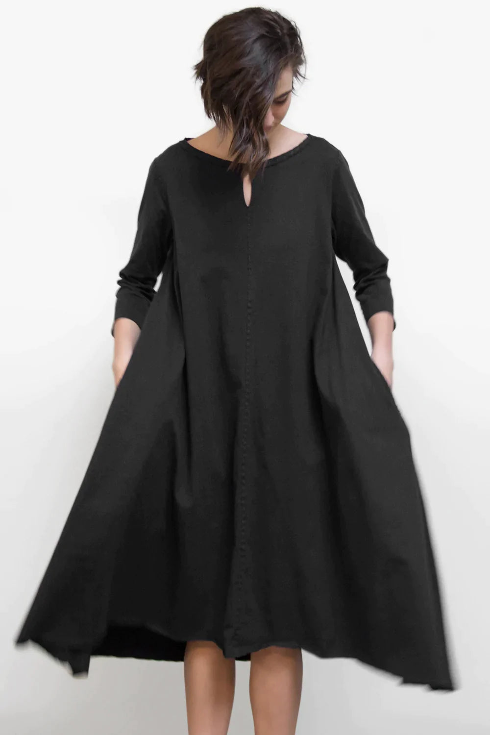 The School of Making model in Keyhole Dress made from 100% organic cotton in black.