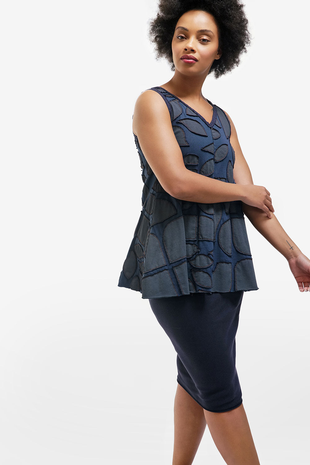 The School of Making model in A-Line Dress in navy with Abstract stencil design.