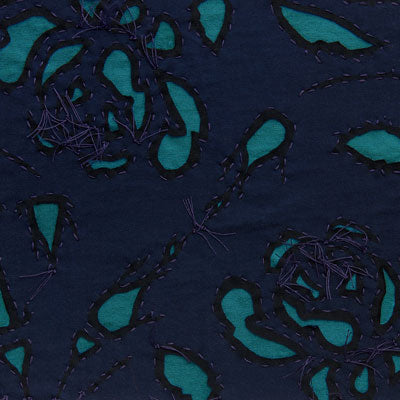 Reverse appliqué rose swatch in navy and teal