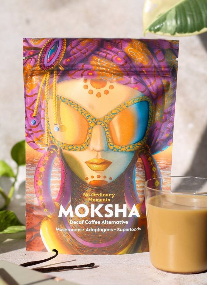 packet of Moksha mushroom coffee next to a cup