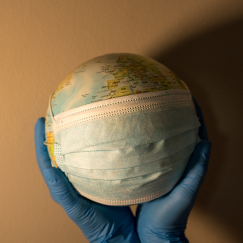 globe with a mask 