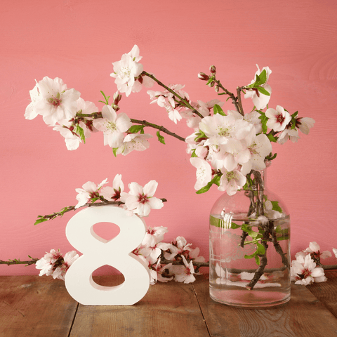 flowers in a vase and number eight