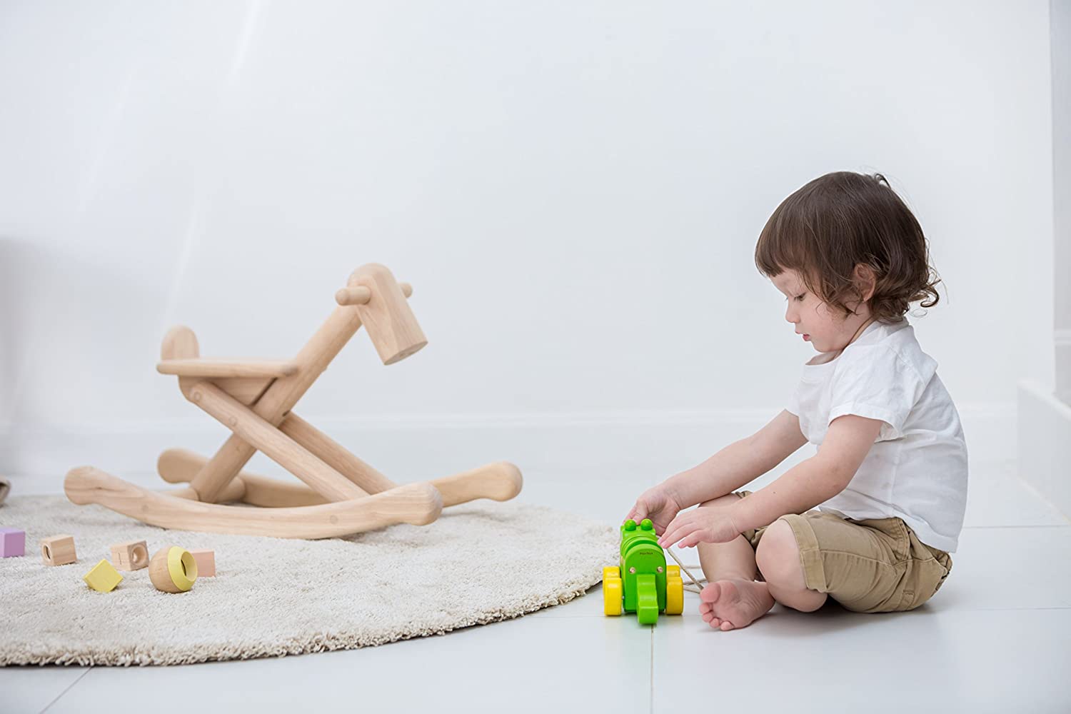 plan toys foldable rocking horse