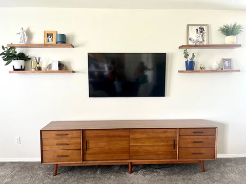 floating shelves around tv