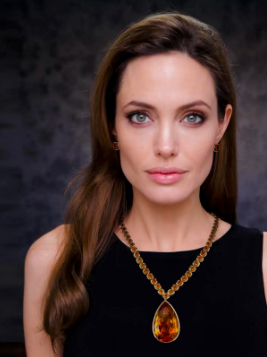 Angelina Joline with a huge Citrine necklace