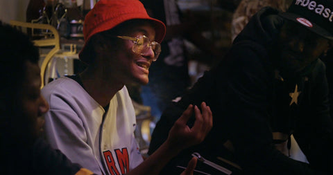 actor Khadim Diop pontificates in an Unarmed jersey dedicated to Mike Brown in a scene from the film 72 Hours: a Brooklyn Love Story