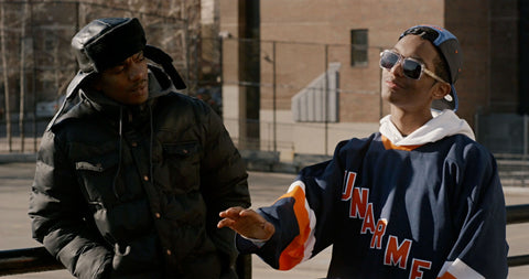 actor Khadim Diop, pictured with David Shaw, wears an Unarmed jersey dedicated to Eric Garner in a scene from the film 72 Hours: a Brooklyn Love Story
