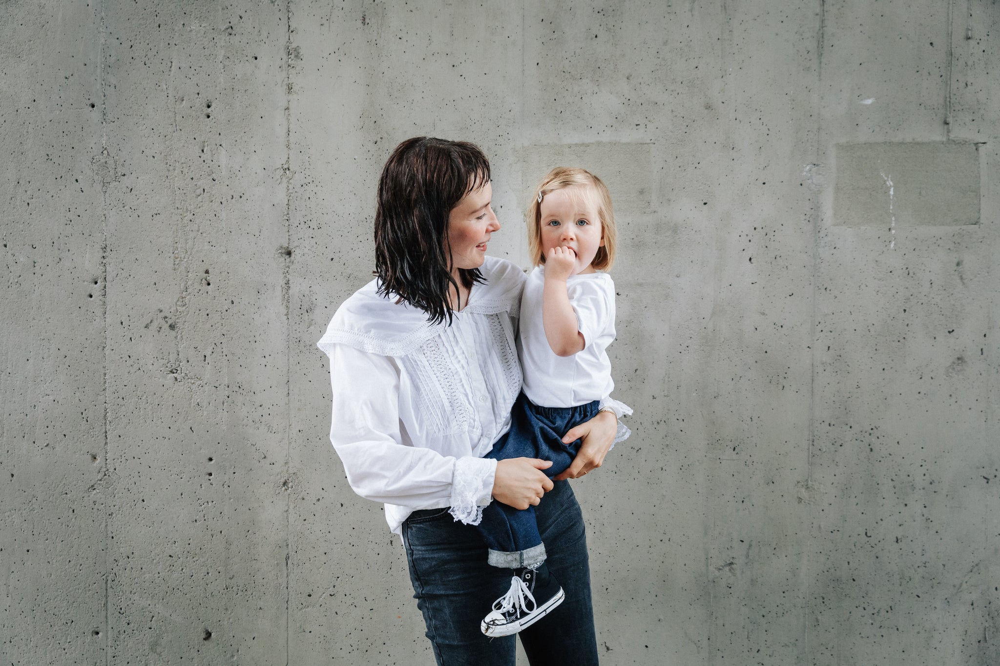 Founder of Pippins Denim with her daughter wearing a pair of Pippins jeans