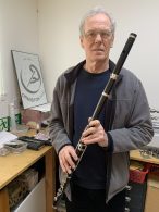 George in the finishing workshop with alto flute