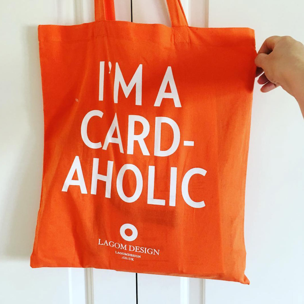 A photo of a bag which reads: I'm a card-aholic