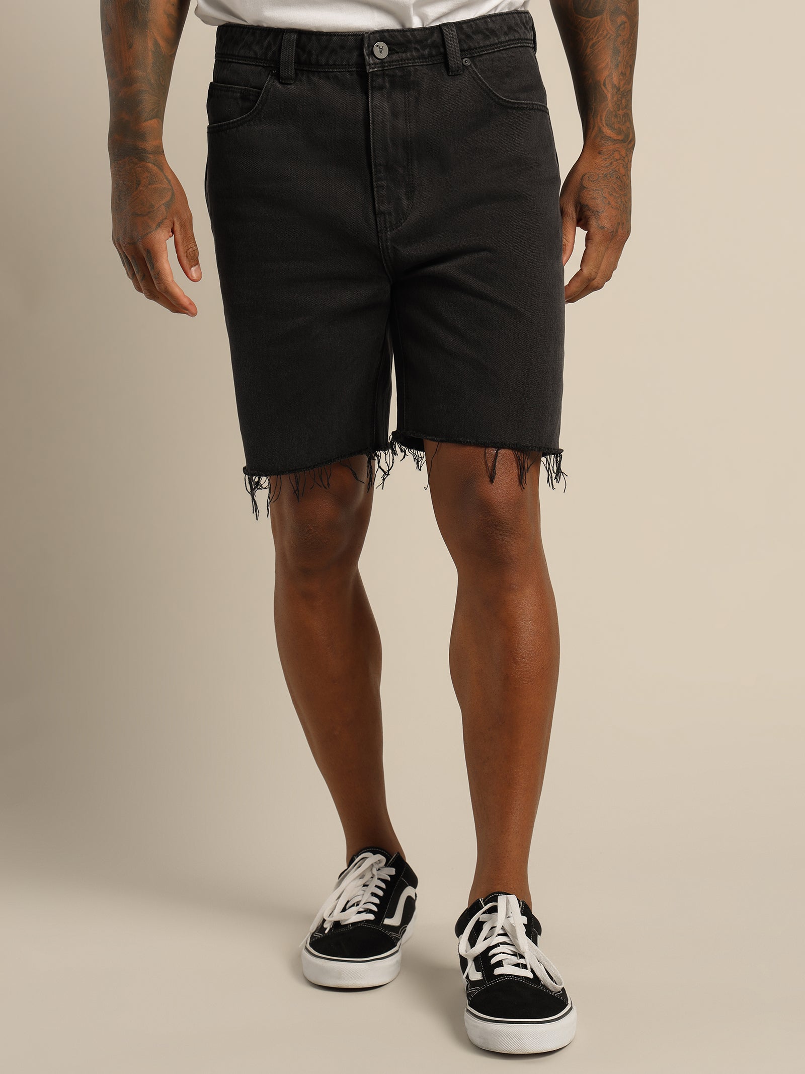 A Dropped Skinny Short in Black Sky Denim