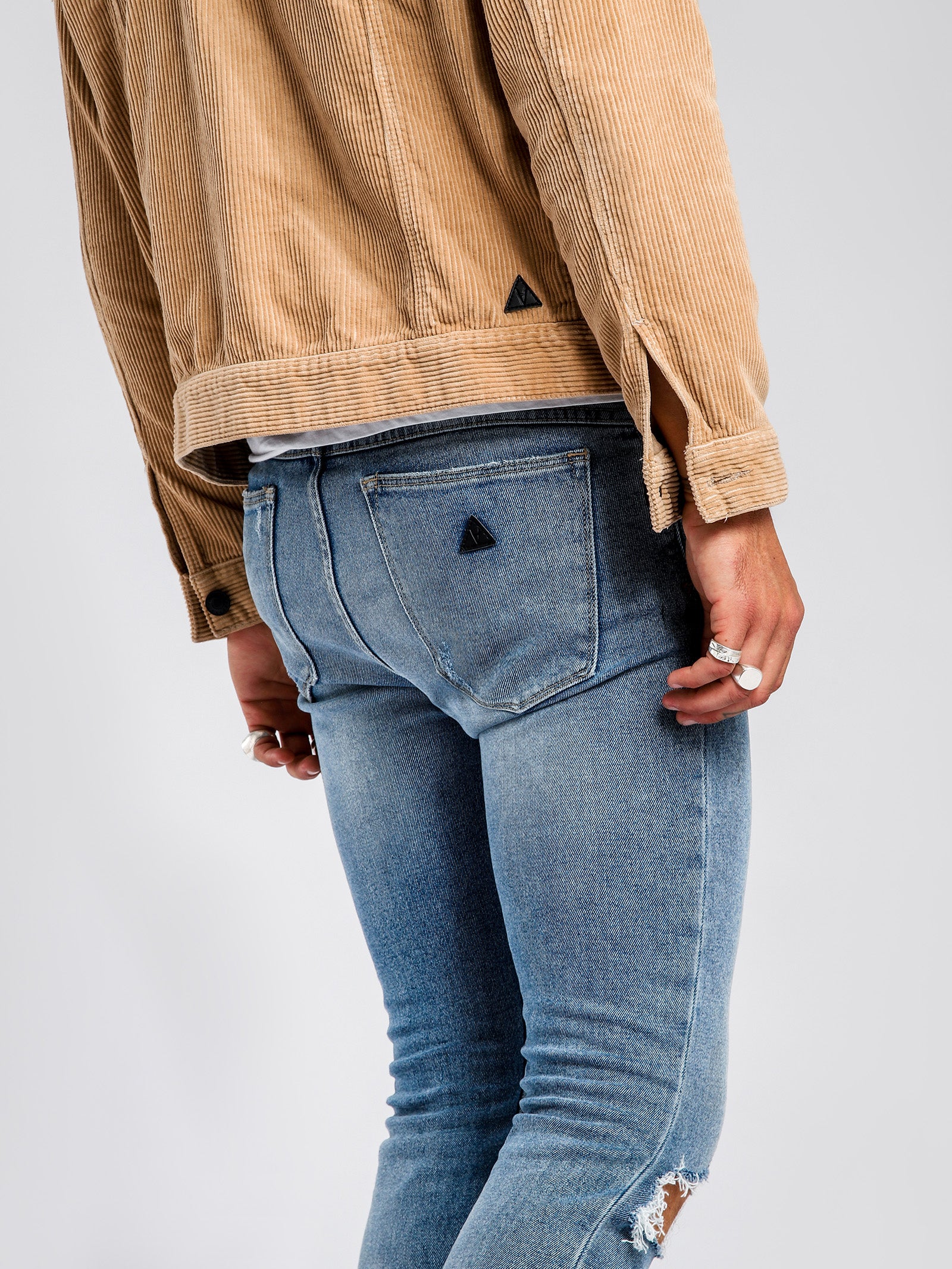 A Dropped Skinny Turn Up Jean in Scuzz Blues Denim