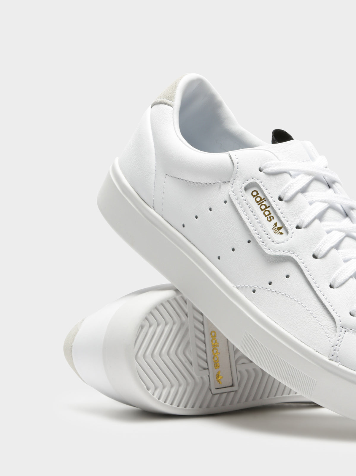 Womens Sleek Leather Sneakers in White Glue Store