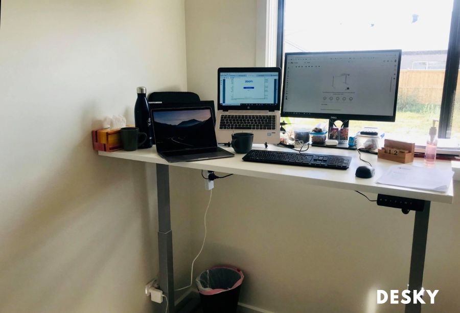 white and grey computer standing desk