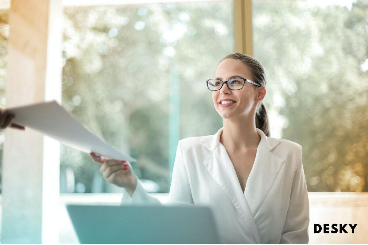 An employee who is happy and healthy at the workplace