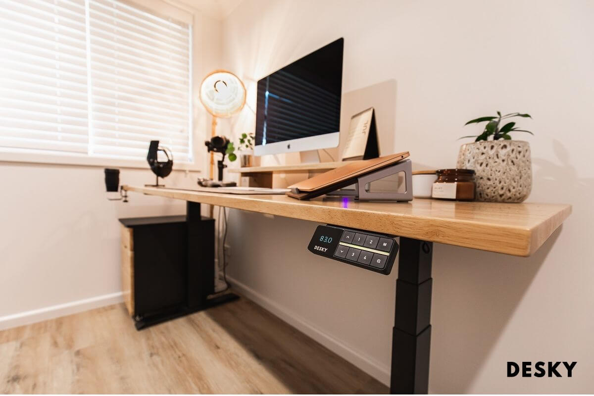 A home office desk with the new desky dual controller