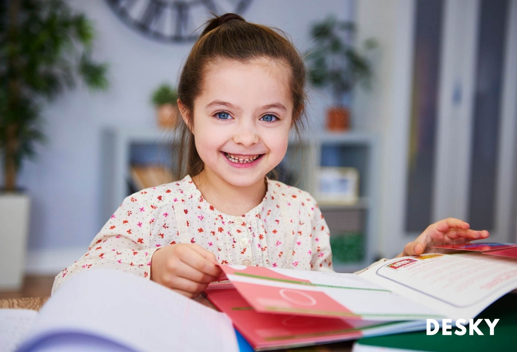 smiling child studying at home