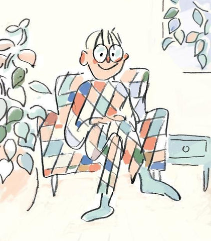 Self portrait of illustrator Tine Modeweg Hansen. Tine is pictured sitting in an armchair, her outfit matches the pattern of the armchair.