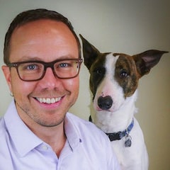 Christopher Pachel, Twin Cities Veterinary Behavior Clinic veterinary surgeon, with his dog