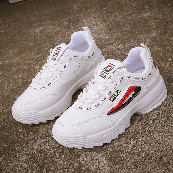 fila disruptor glossy white