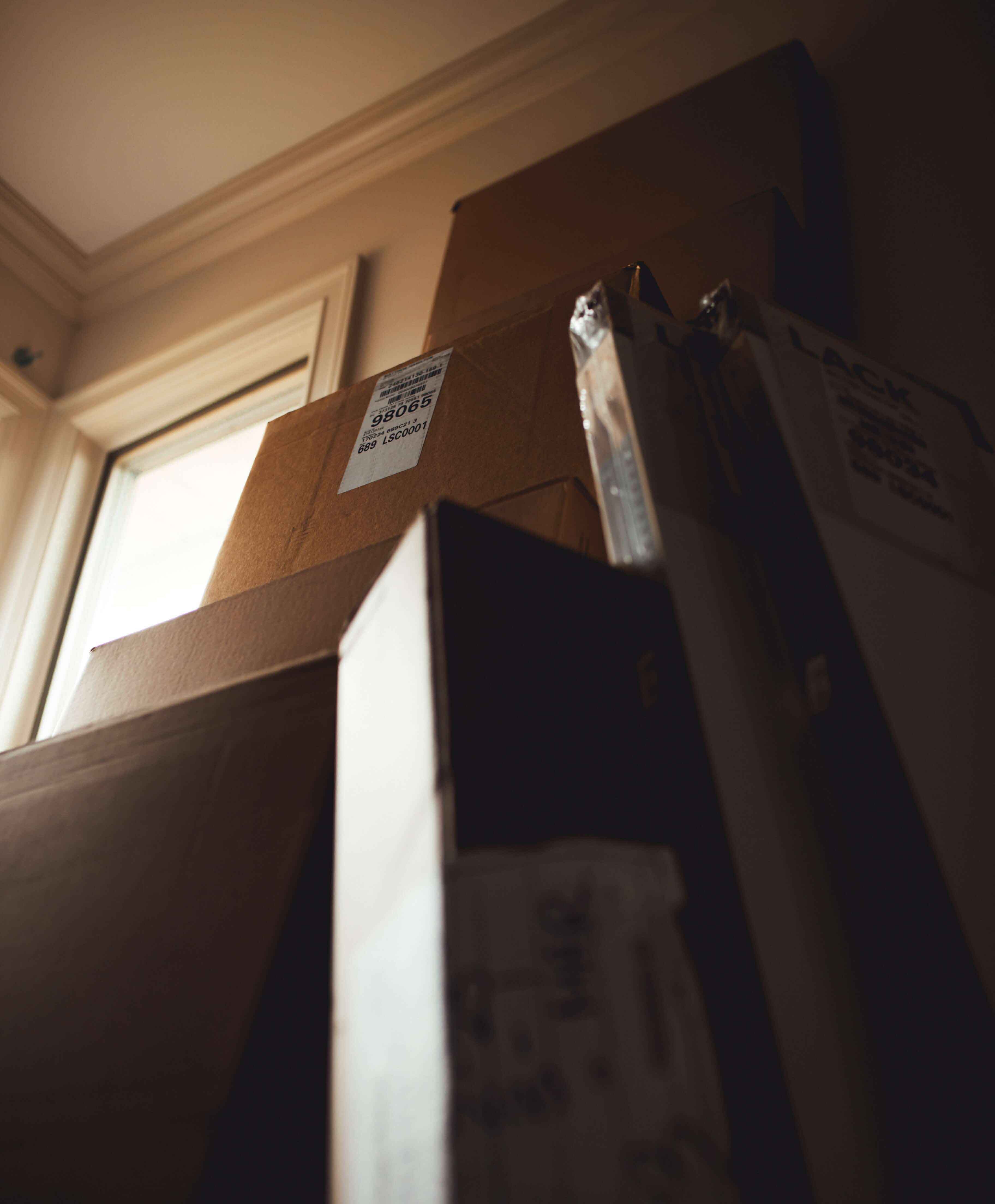 packages stacked up by a doorway