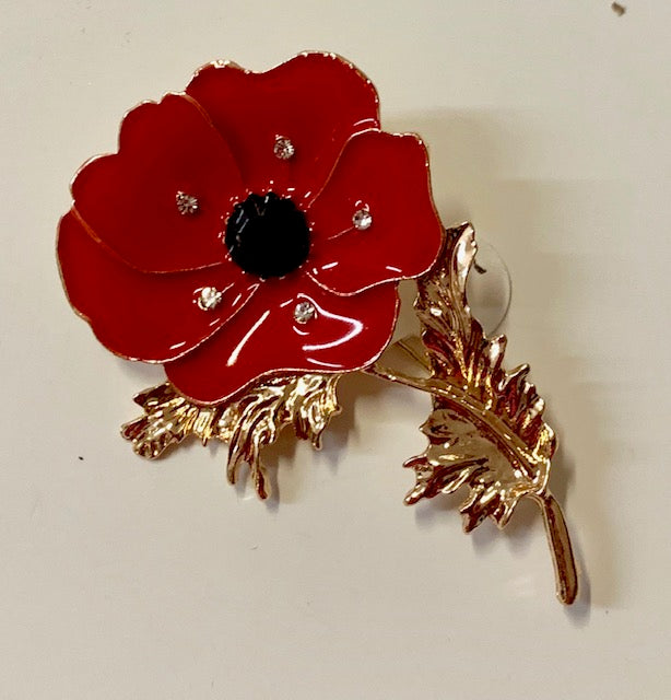 red brooch