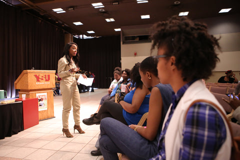 Sharmayne Bolling speaking at Carmella Marie's 2016 Let's Talk hair the mane event