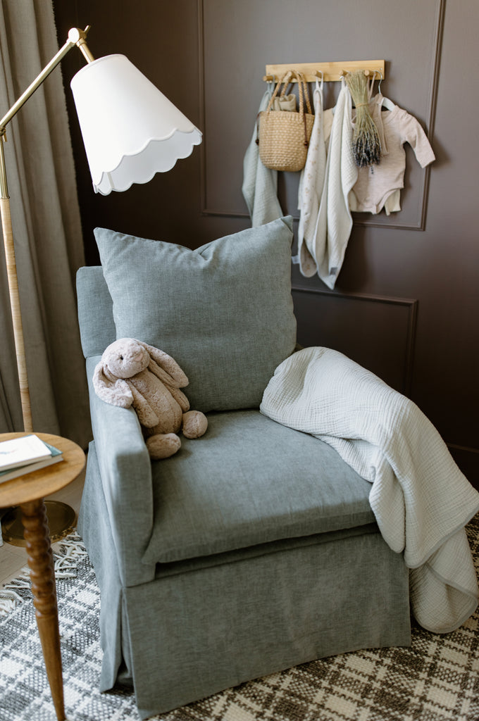 Zoey swivel nursery glider in dream celadon fabric