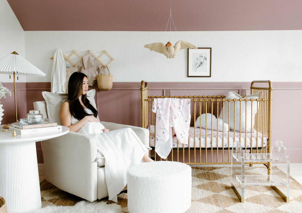 mauve nursery ideas with vintage gold crib, Crane bedding and glider