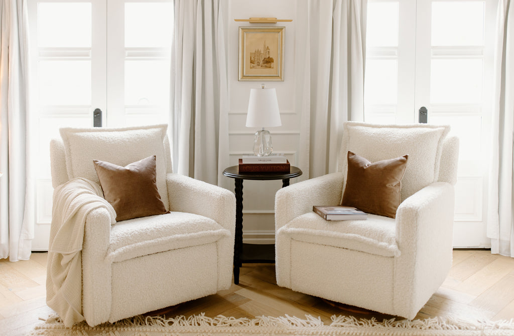 sheepskin cloud fabric recliner in living room with throw pillow and throw blanket