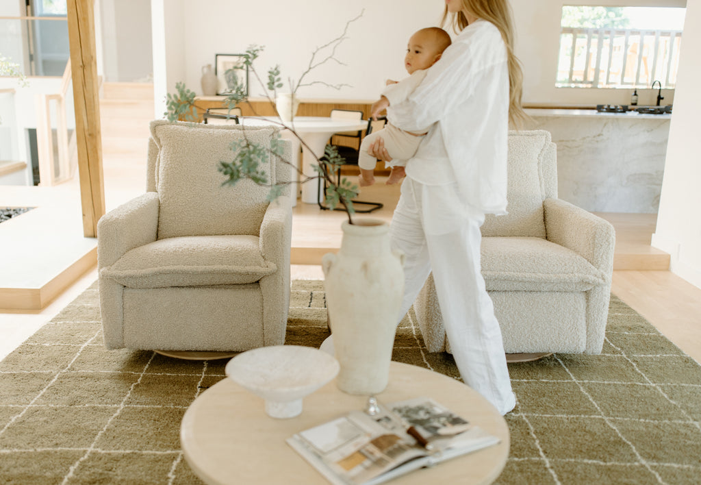 organic modern interior design with neutral checkered floor rug and recliners