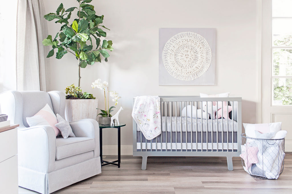 light gray nursery idea with woodland animals bedding