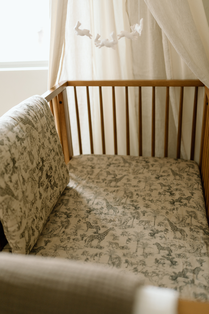 oilo vintage safari crib sheet in crib