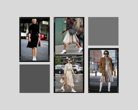 street shots for New York fashion week with women styling white boots