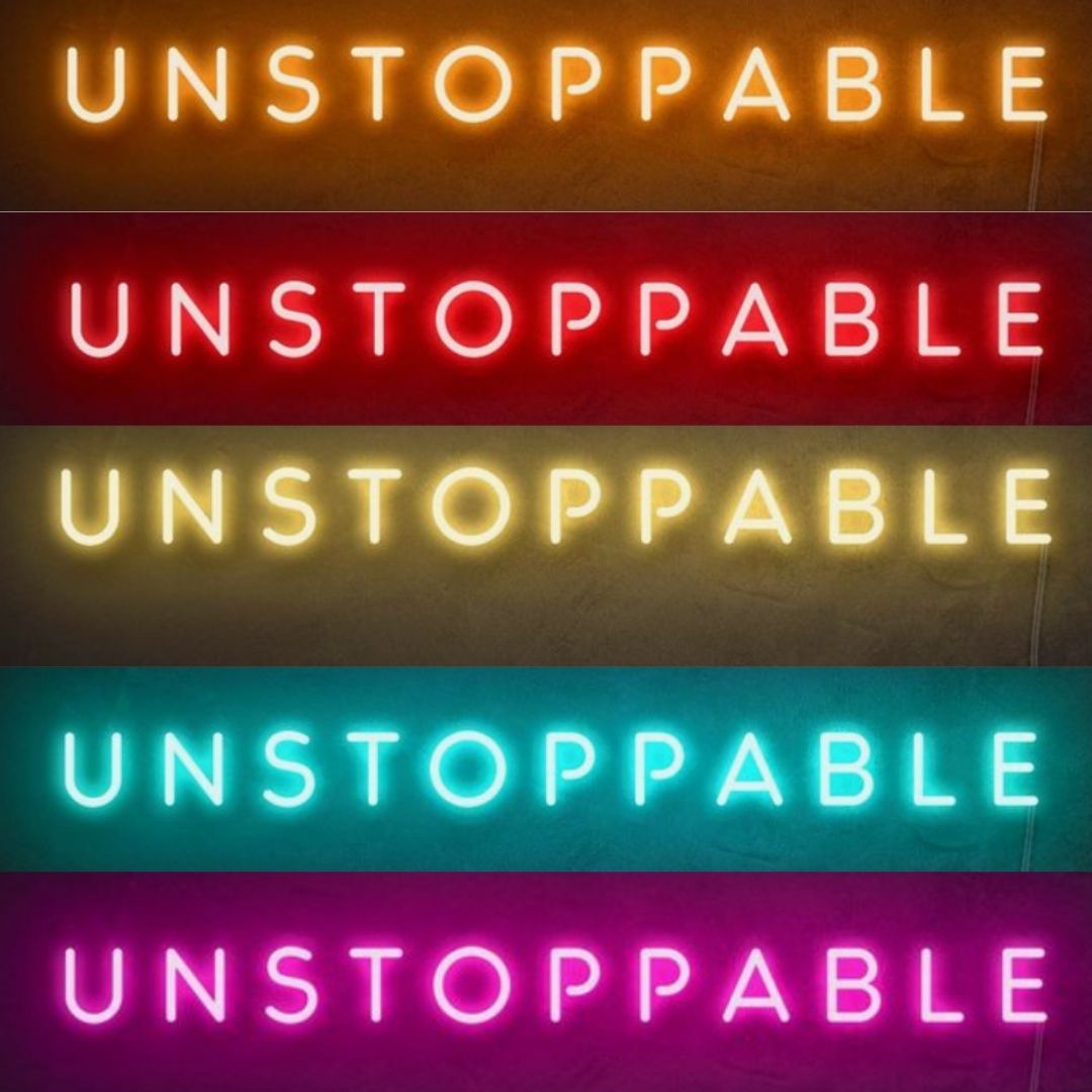 multi colour neon sign saying unstoppable