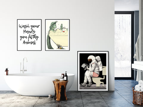 Wall art prints for bathrooms - a set of three bathroom prints featuring a humourous quote print, a funny dinosaur in the bath art print and an astronaut on the toilet wall art poster